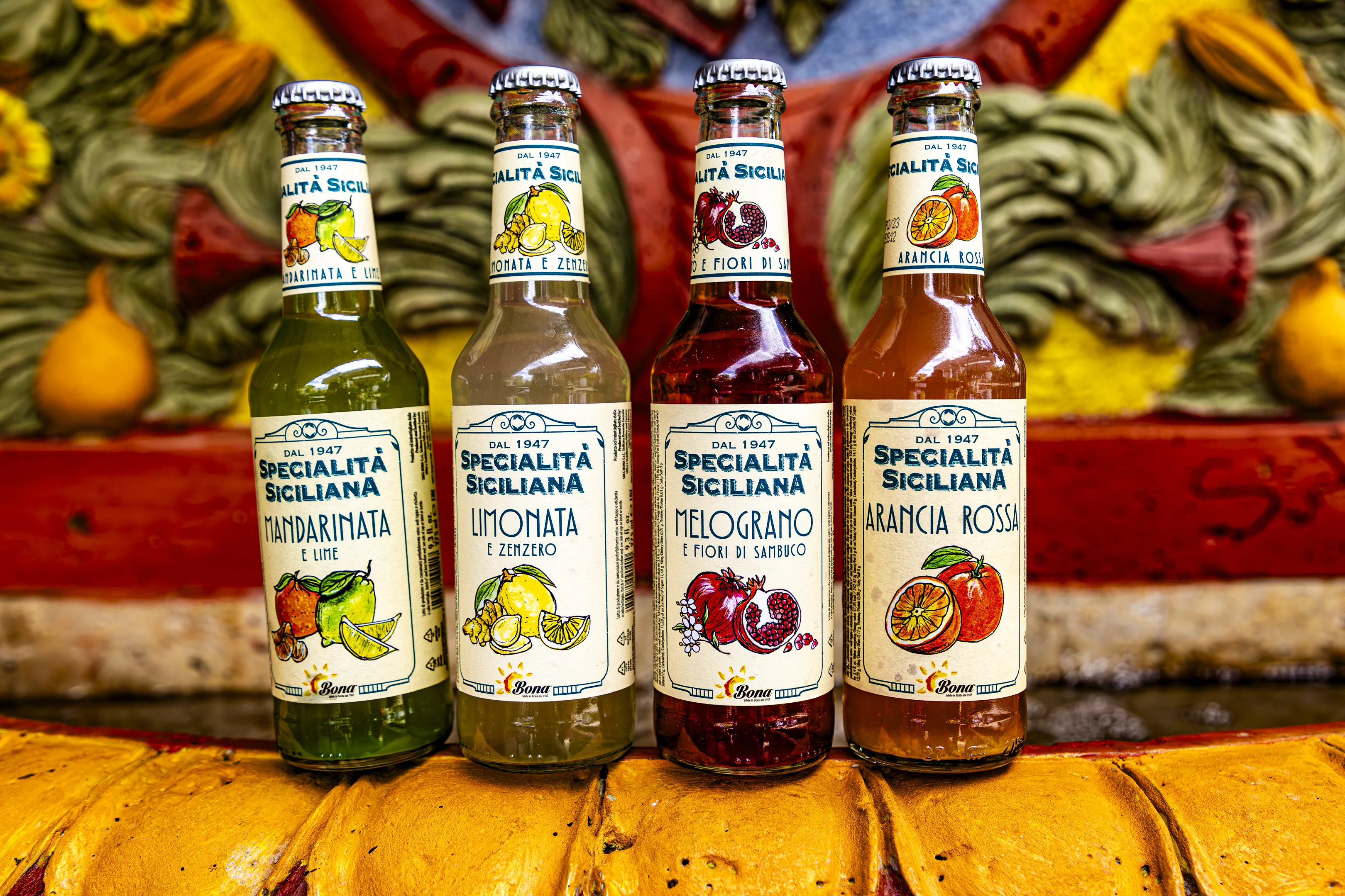 Limonades artisanales siciliennes sur une fontaine sculptée